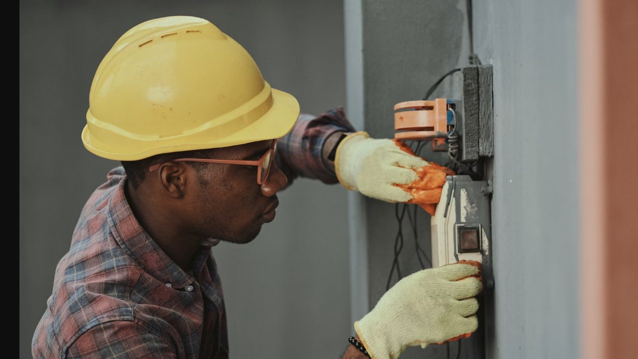 Field technician working with electrical equipment